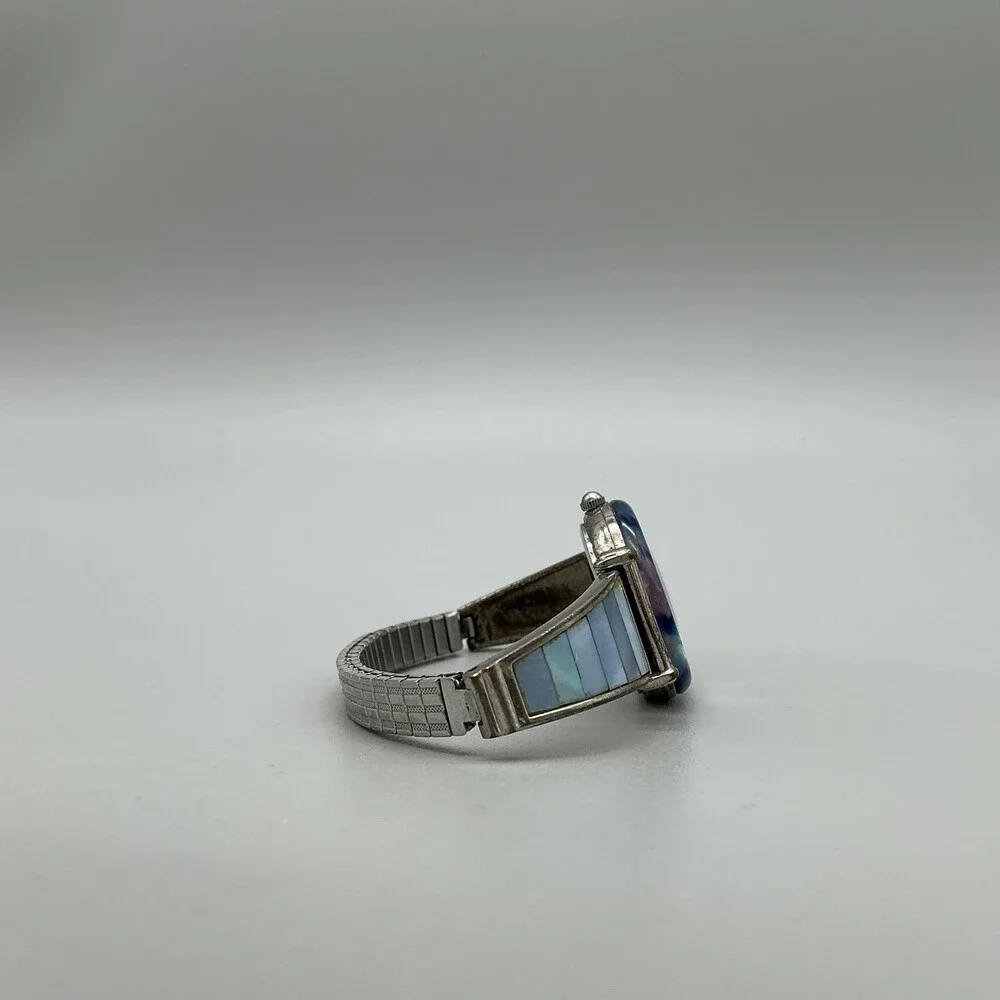 Avon F69038-1/P Women Watch 27mm Silver Tone Blue Bezel Stretch Band New Battery